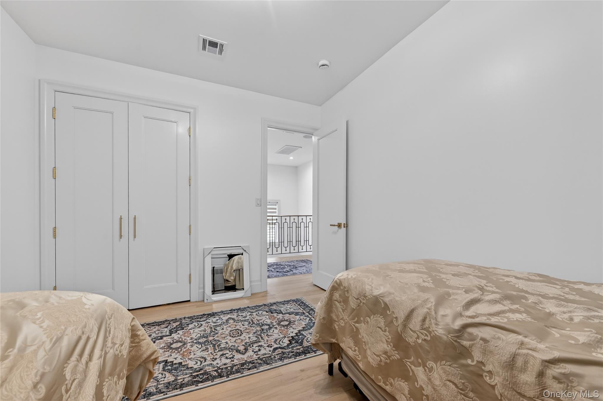 27 Ellish Parkway, Unit 203 Spring Valley, NY 10977 - Photo 28 of 47 a bedroom with a bed and a window