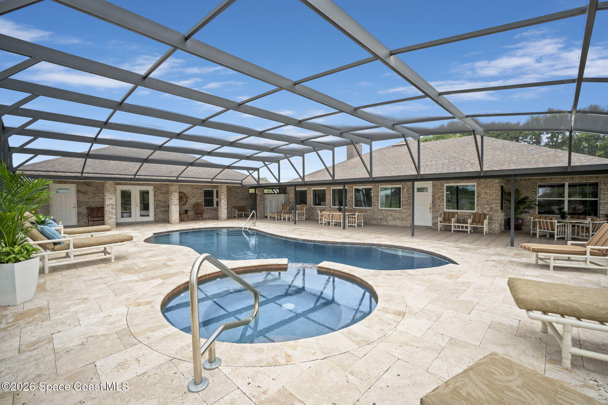 3125 Davis Road Mims, FL 32754 - Photo 29 of 47 a view of a swimming pool with a patio