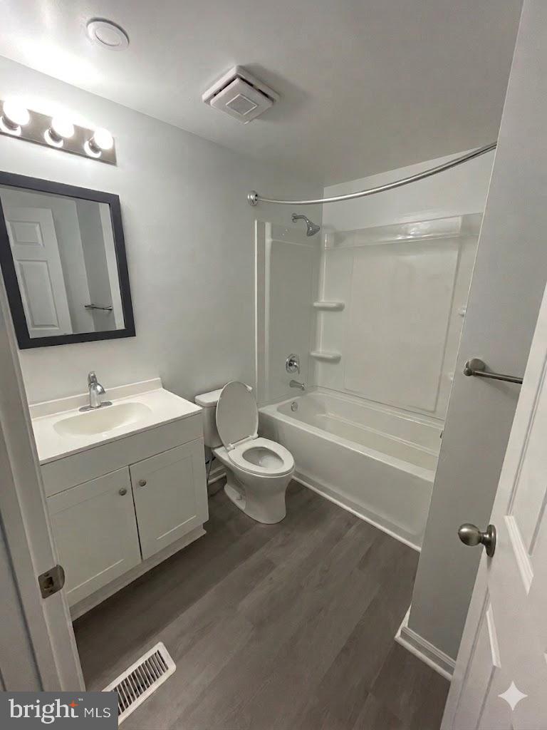 172 Rogers Mill Road Strasburg, VA 22657 - Photo 15 of 23 a bathroom with a double vanity sink toilet mirror and bathtub
