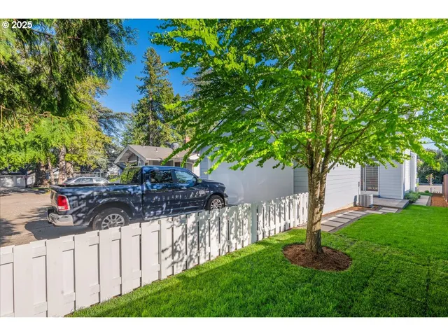a view of a car in front of a house