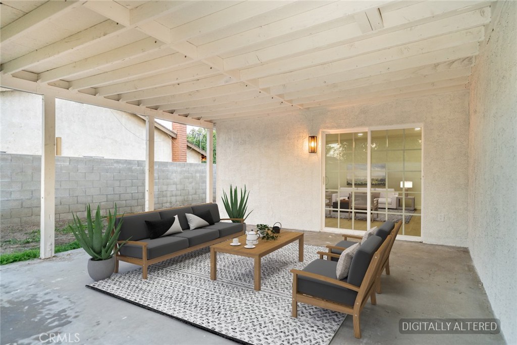 555 North Chestnut Avenue Rialto, CA 92376 - Photo 31 of 33 a patio with patio couch and table