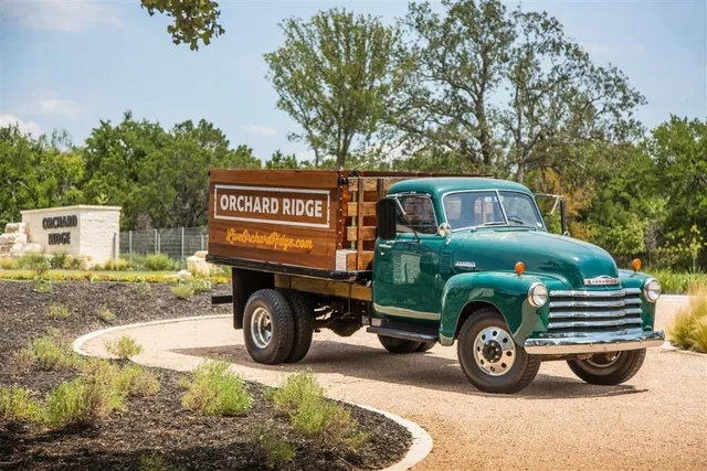 a view of a house with a big yard