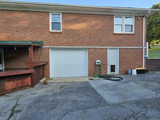 a view of a house with a street