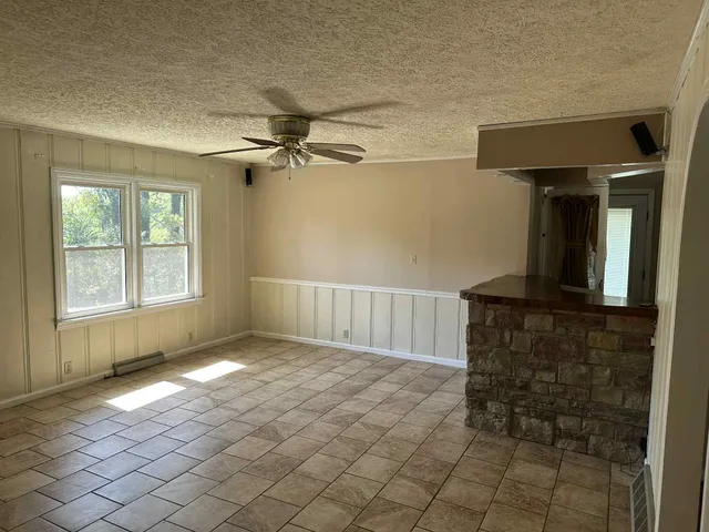 a view of entryway with a front door