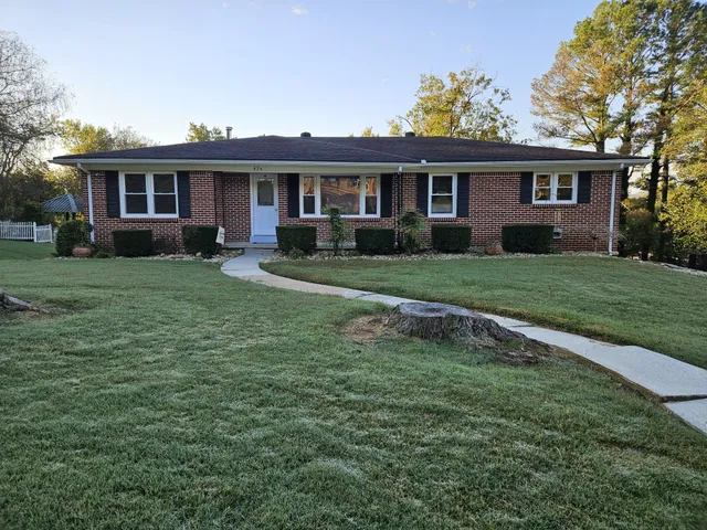 front view of a house and a yard