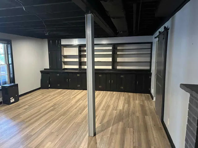 a bathroom with a bathtub and shower