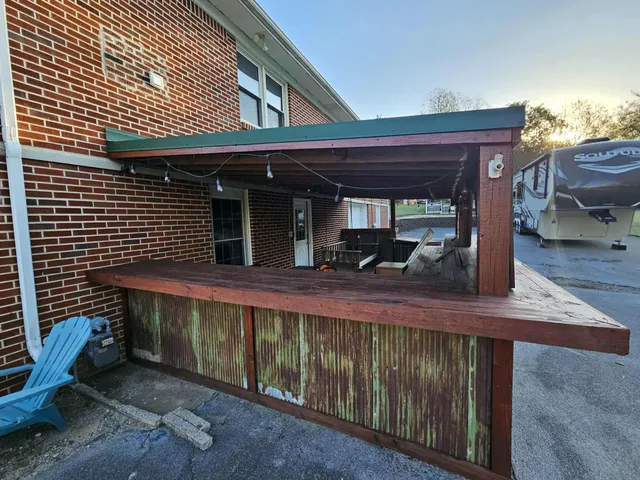 a view of a porch with furniture