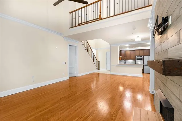 a view of a kitchen counter space with wooden floor