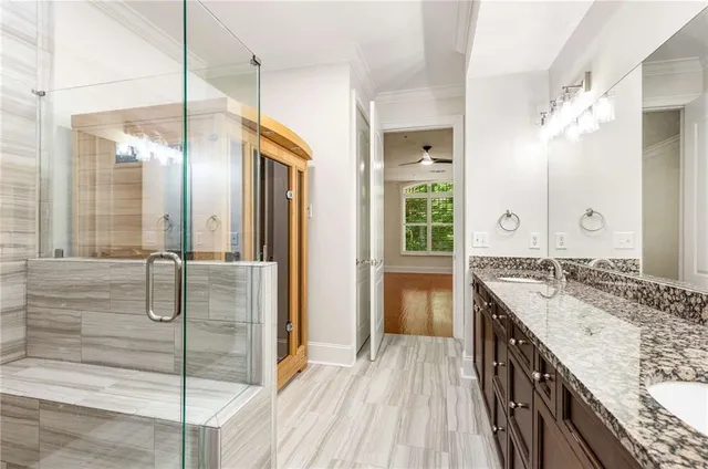 a bathroom with a bathtub and a shower