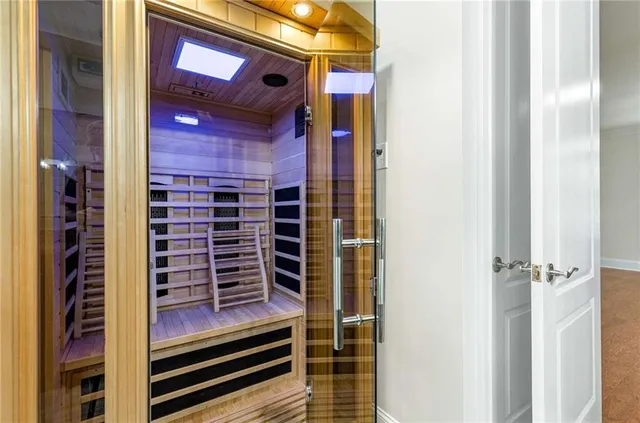 a view of a hallway with windows