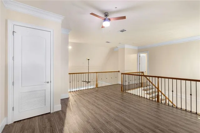 a view of parking garage with cars parked