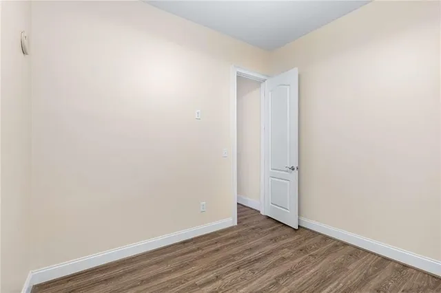 a view of a livingroom with furniture and windows