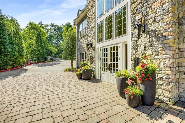 a view of a street with trees on both side of it