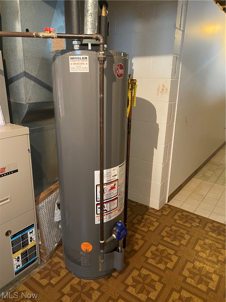 1518 Walnut Road Southwest Massillon, OH 44647 - Photo 18 of 26 Utility room with gas water heater