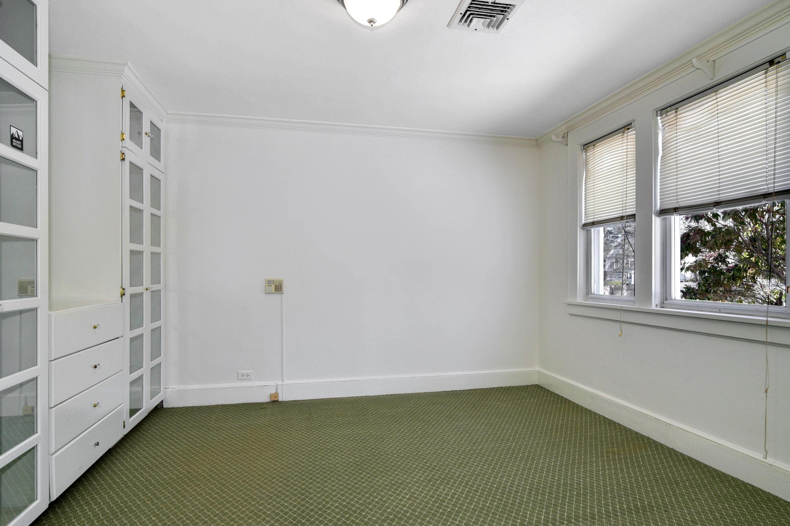 622 High Ridge Road Stamford, CT 06905 - Photo 11 of 19 a view of an empty room with a window