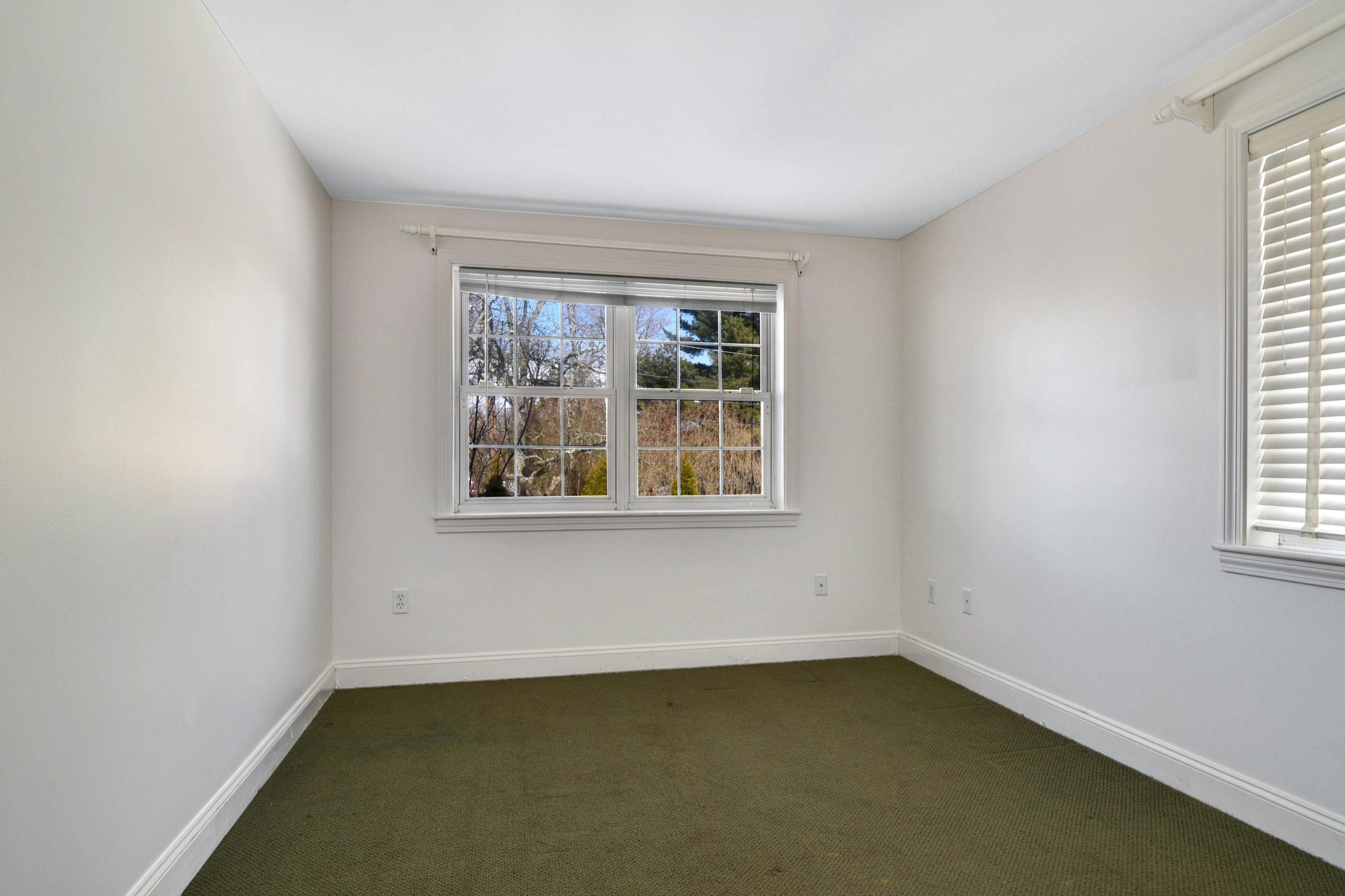 622 High Ridge Road Stamford, CT 06905 - Photo 13 of 19 an empty room with a window