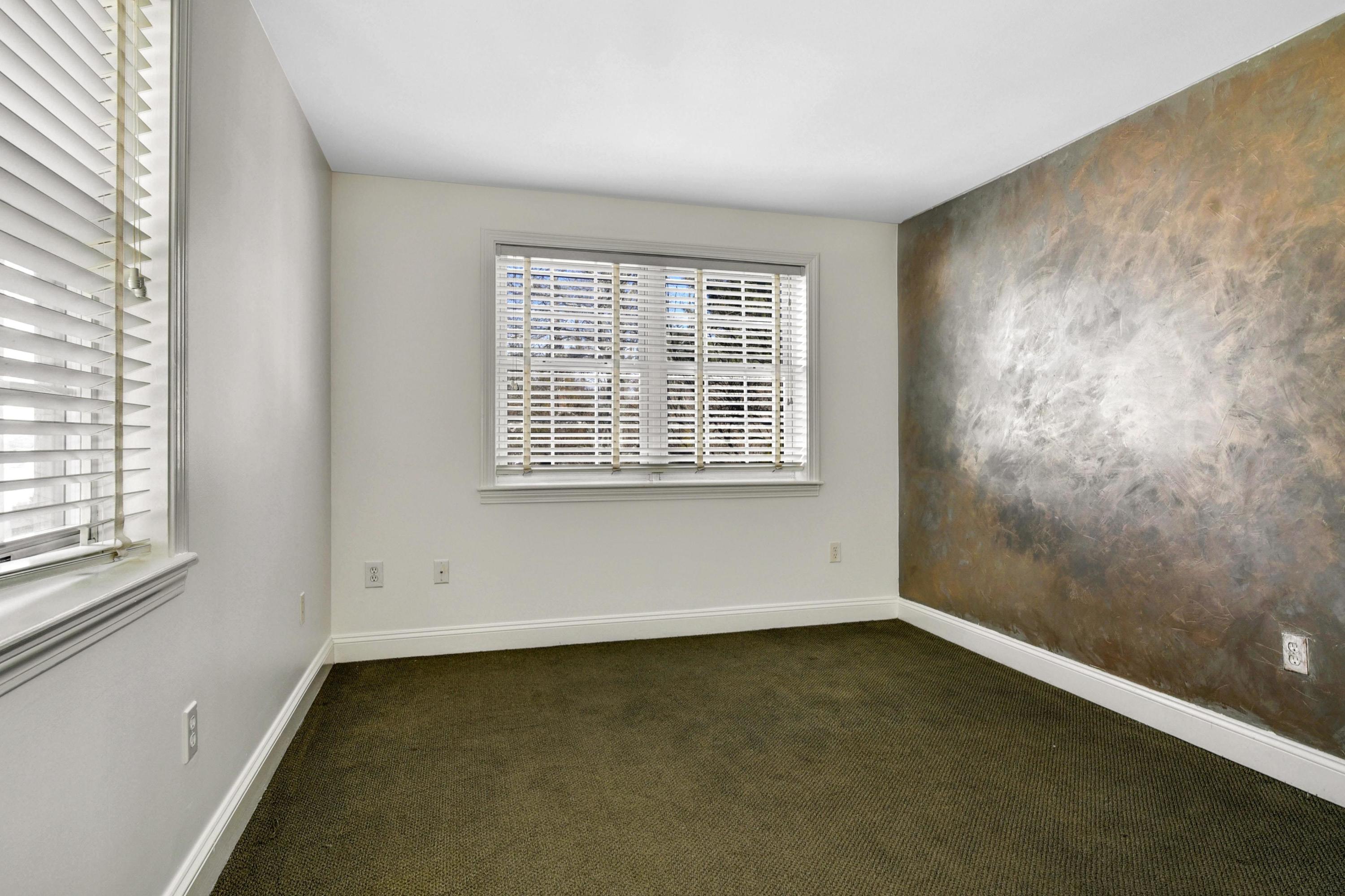 622 High Ridge Road Stamford, CT 06905 - Photo 15 of 19 an empty room with a window