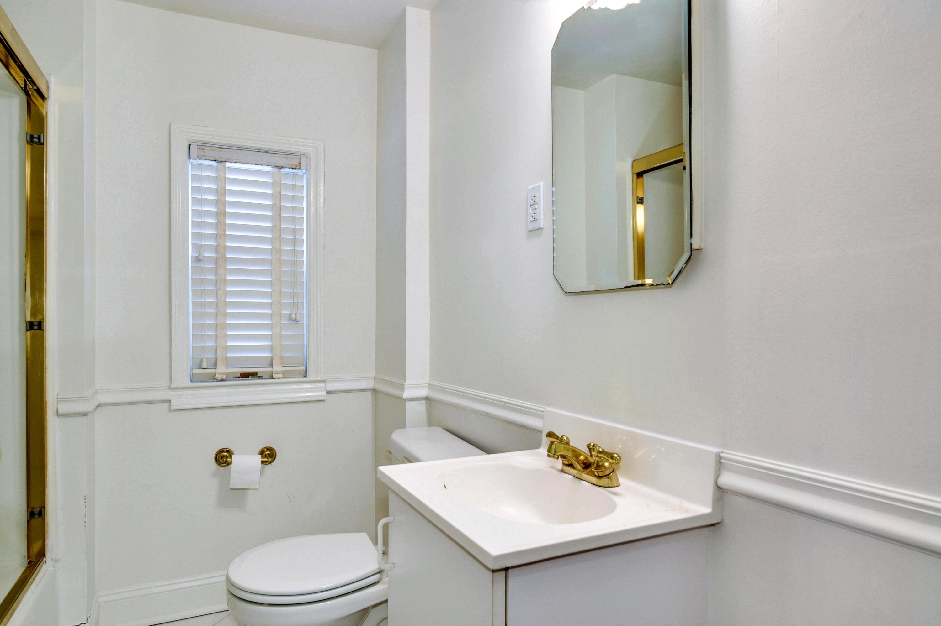 622 High Ridge Road Stamford, CT 06905 - Photo 16 of 19 a bathroom with a toilet sink and mirror