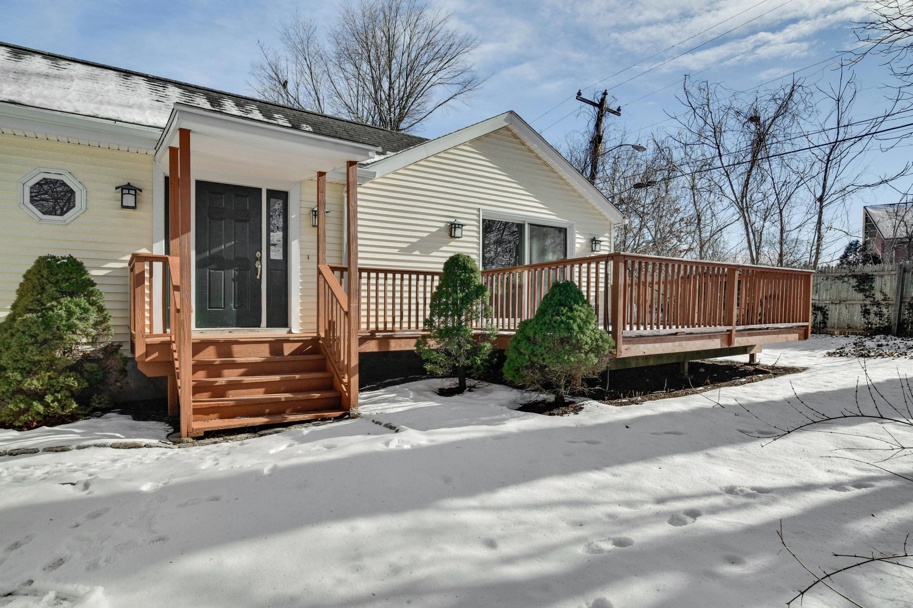 622 High Ridge Road Stamford, CT 06905 - Photo 18 of 19 a front view of a house with a road