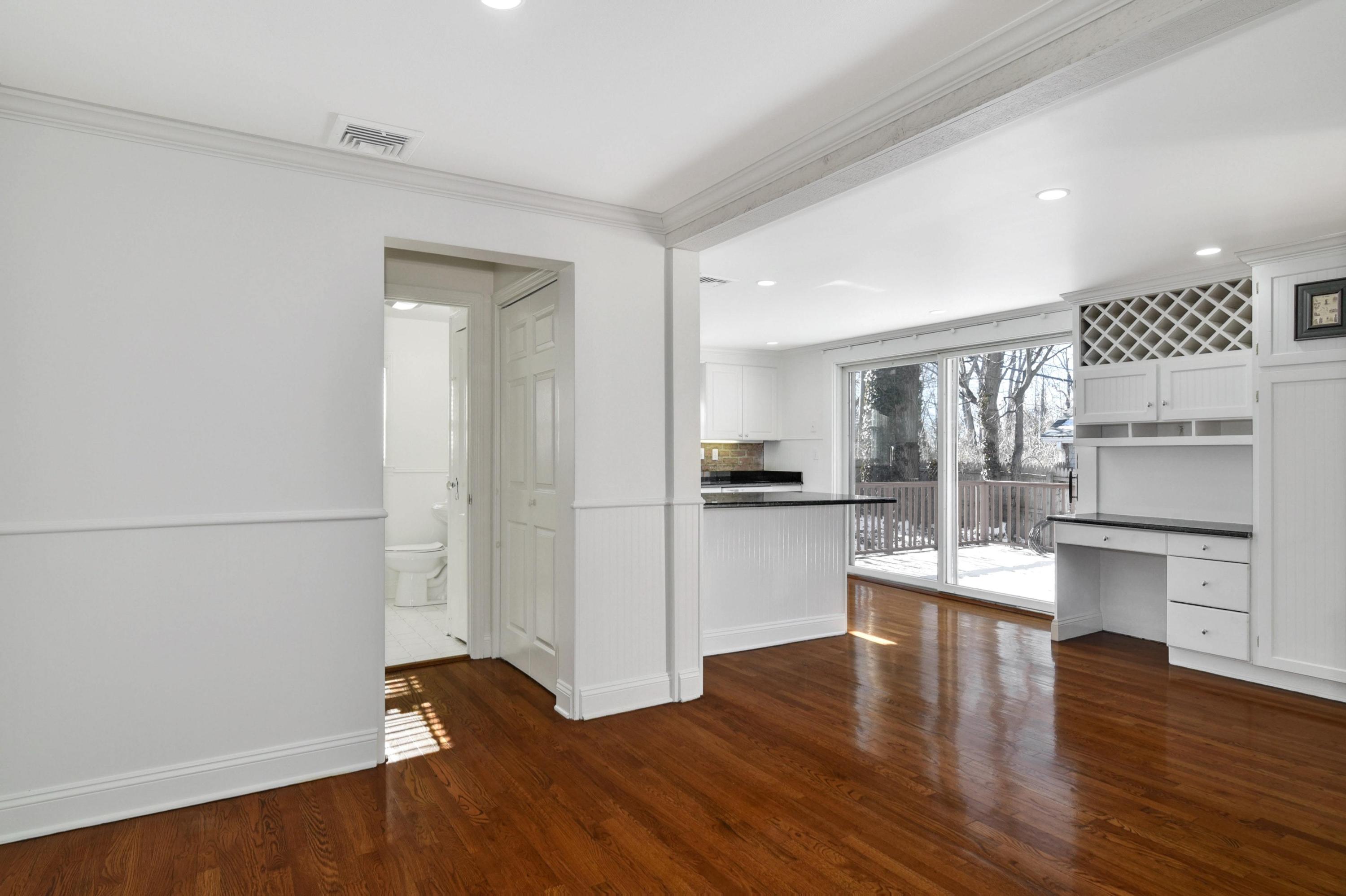 622 High Ridge Road Stamford, CT 06905 - Photo 6 of 19 a room with stainless steel appliances wooden floor and large windows