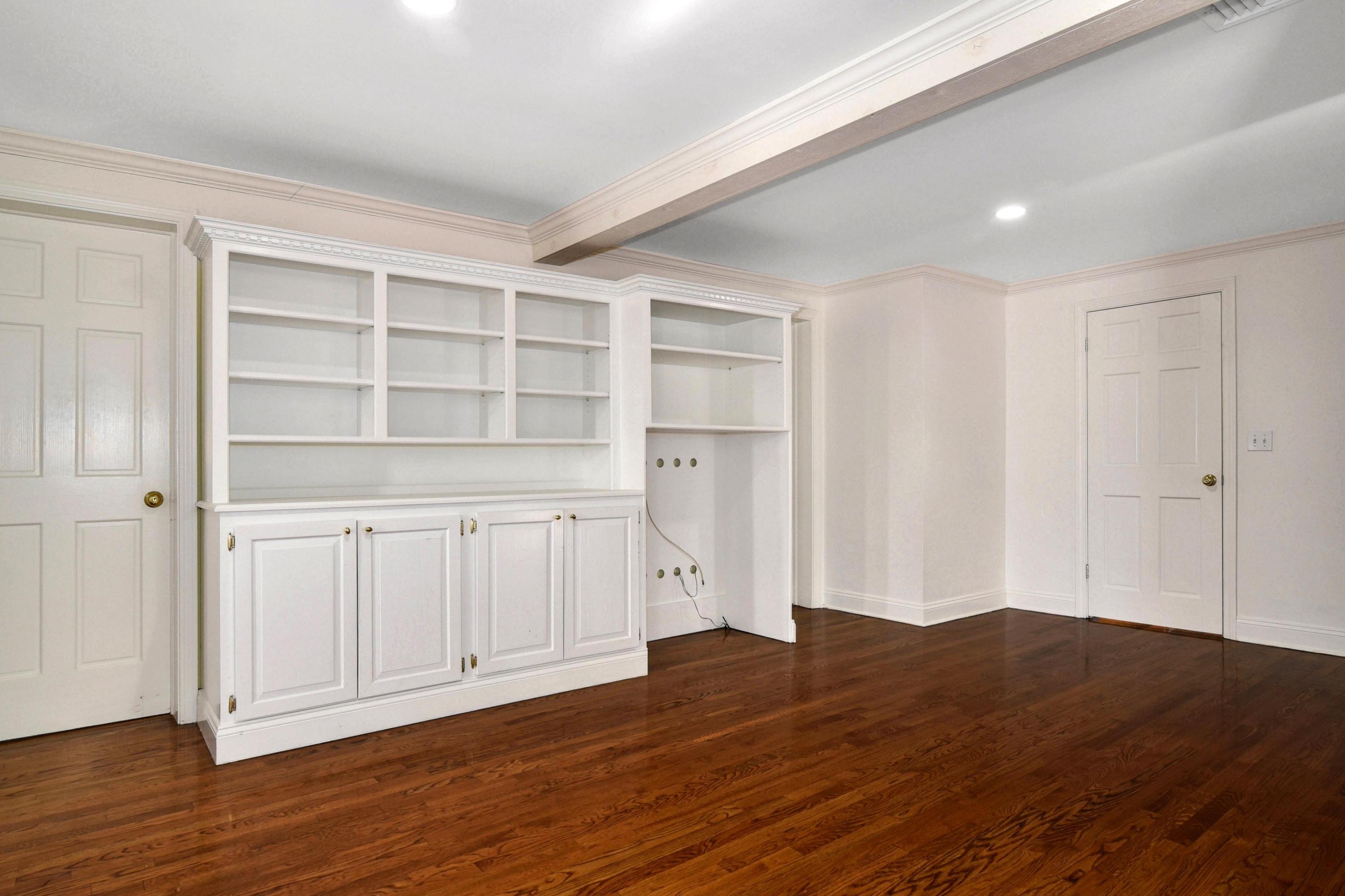 622 High Ridge Road Stamford, CT 06905 - Photo 7 of 19 a view of an empty room with wooden floor