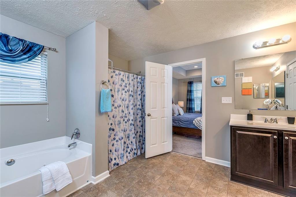 246 Foxwood Road Moon Township, PA 15108 - Photo 17 of 25 Owner's Bath with separate sinks, a dressing area, Whirlpool Tub, separate shower and water closet!