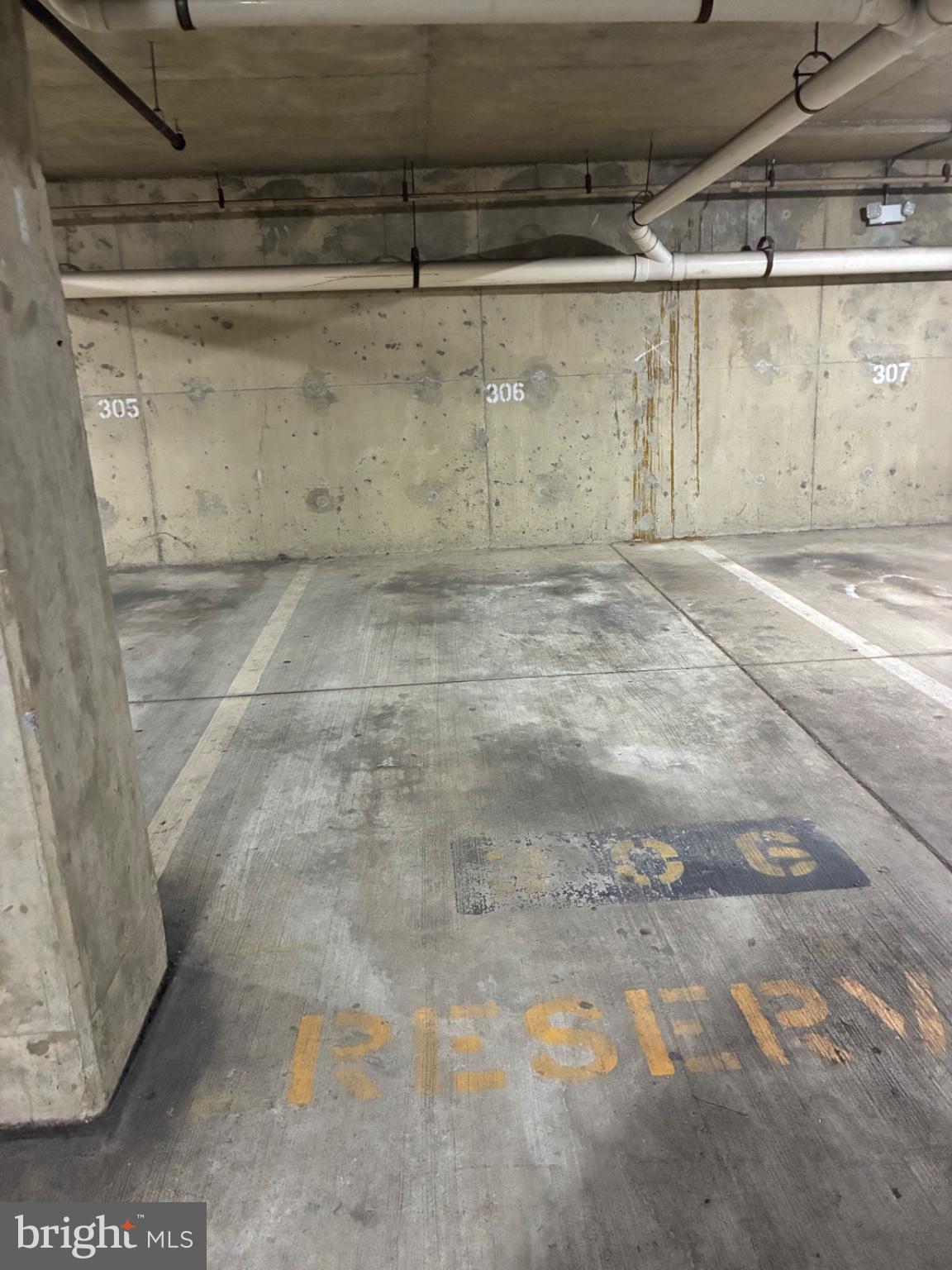 1571 Spring Gate Dr., Unit 6206 McLean, VA 22102 - Photo 9 of 26 Reserved parking space in a garage.