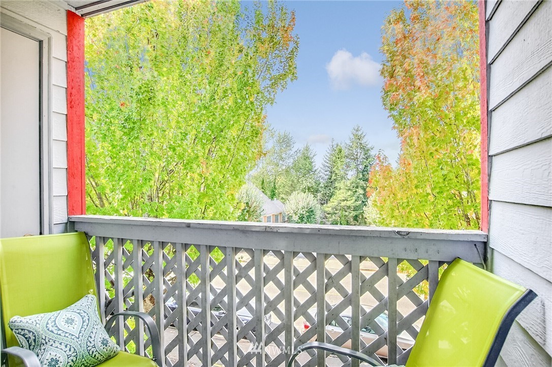 3939 10th Street Southeast, Unit A2 Puyallup, WA 98374 - Photo 9 of 27 a view of a swimming pool from a balcony