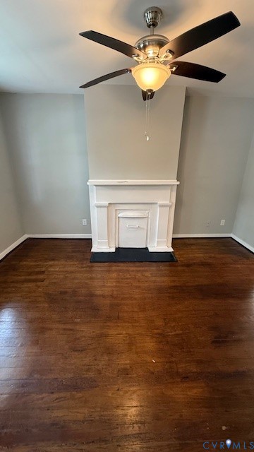 1424 Decatur Street Richmond, VA 23224 - Photo 12 of 30 a view of an empty room with wooden floor and a ceiling fan