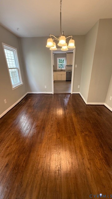 1424 Decatur Street Richmond, VA 23224 - Photo 14 of 30 a view of a room with wooden floor water heater and a window