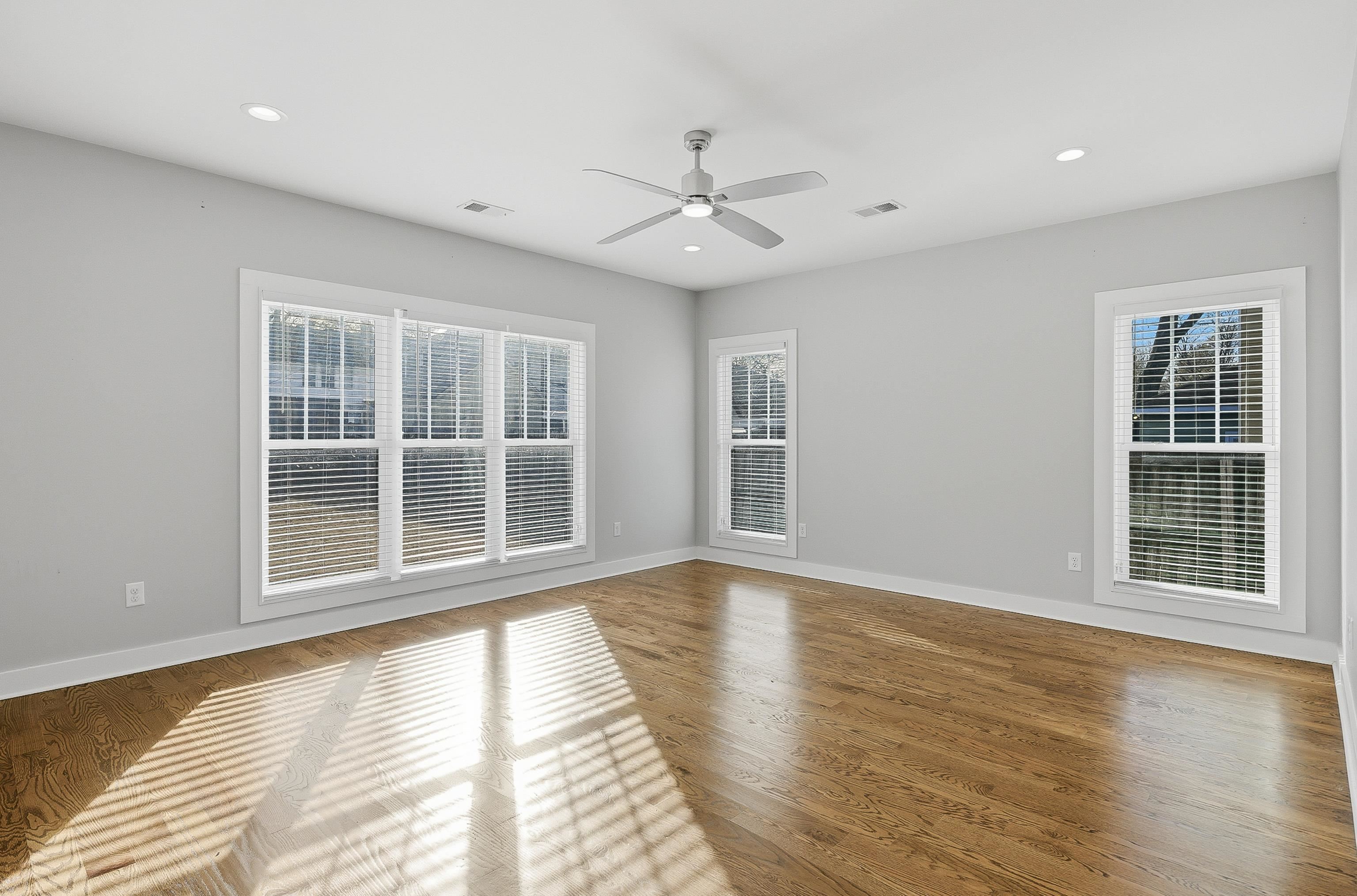 1925 Evelyn Avenue Memphis, TN 38104 - Photo 26 of 30 a view of empty room with wooden floor and fan