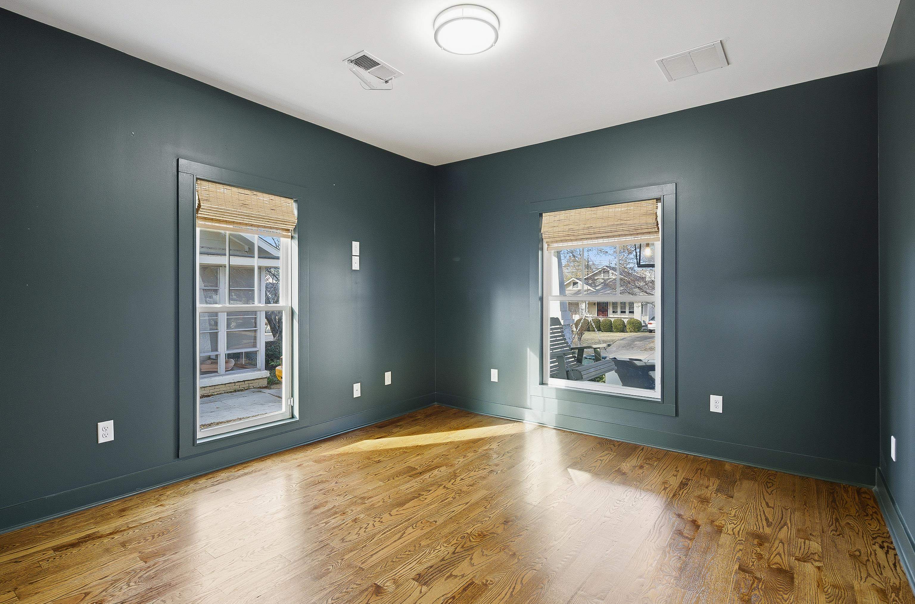 1925 Evelyn Avenue Memphis, TN 38104 - Photo 5 of 30 a view of an empty room with window and wooden floor