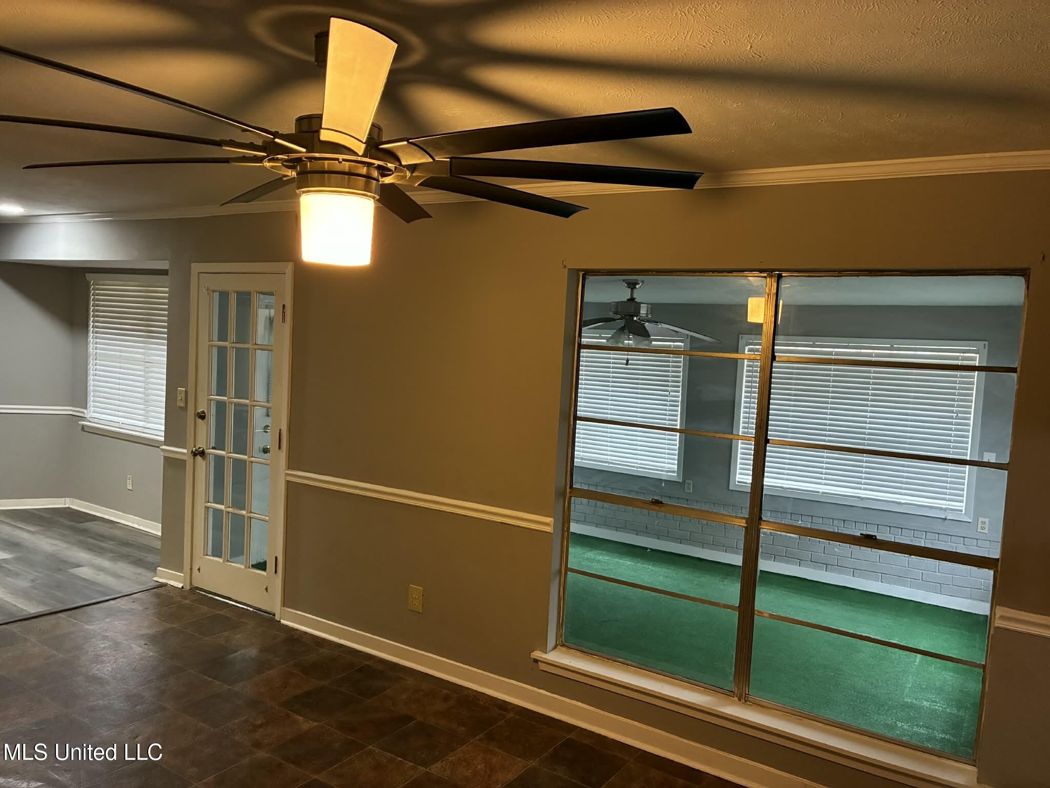 228 Mikell Street Jackson, MS 39212 - Photo 15 of 29 SUNROOM AND DOOR