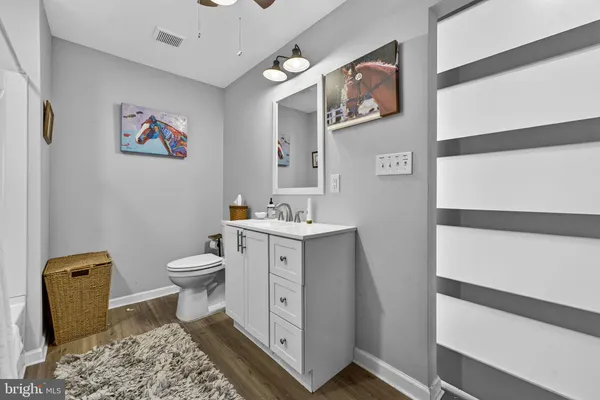 a bathroom with a tub and a shower