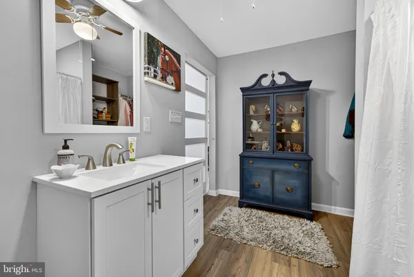 a utility room with sink dryer and washer