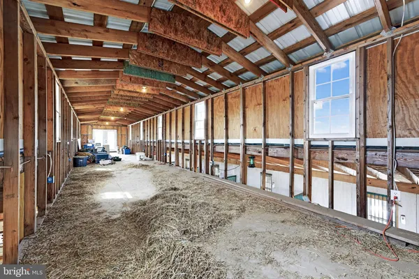 a view of a balcony with wooden floor