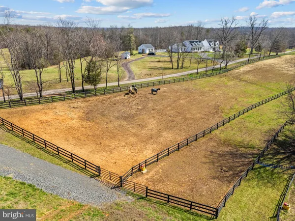 a view of swimming pool with a patio