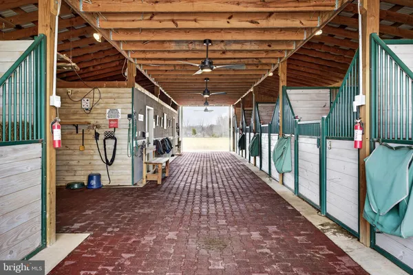 a view of a porch with wooden floor