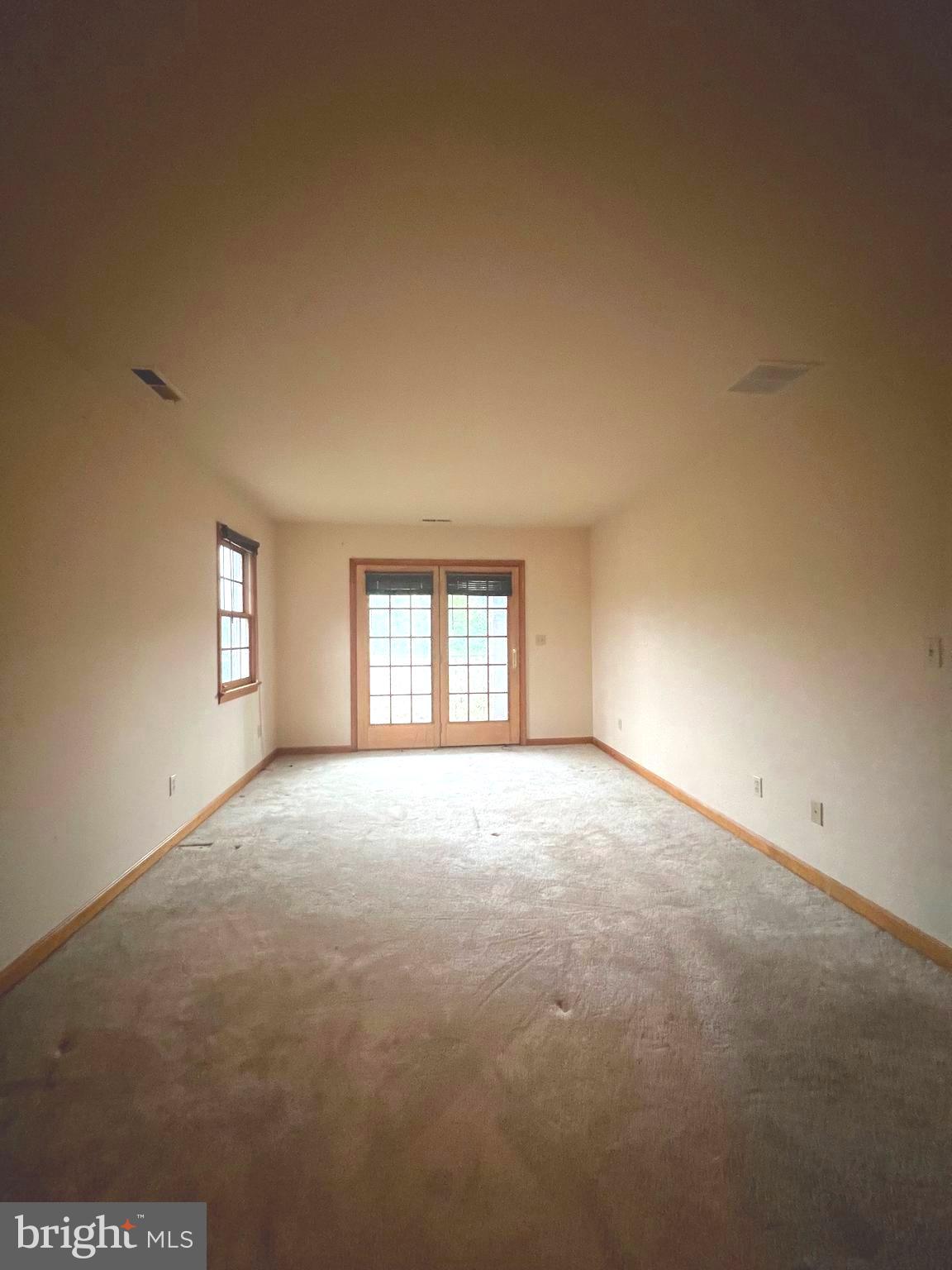 30883 Ward Road Salisbury, MD 21804 - Photo 31 of 34 a view of empty room with windows