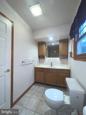 a view of balcony with wooden floor