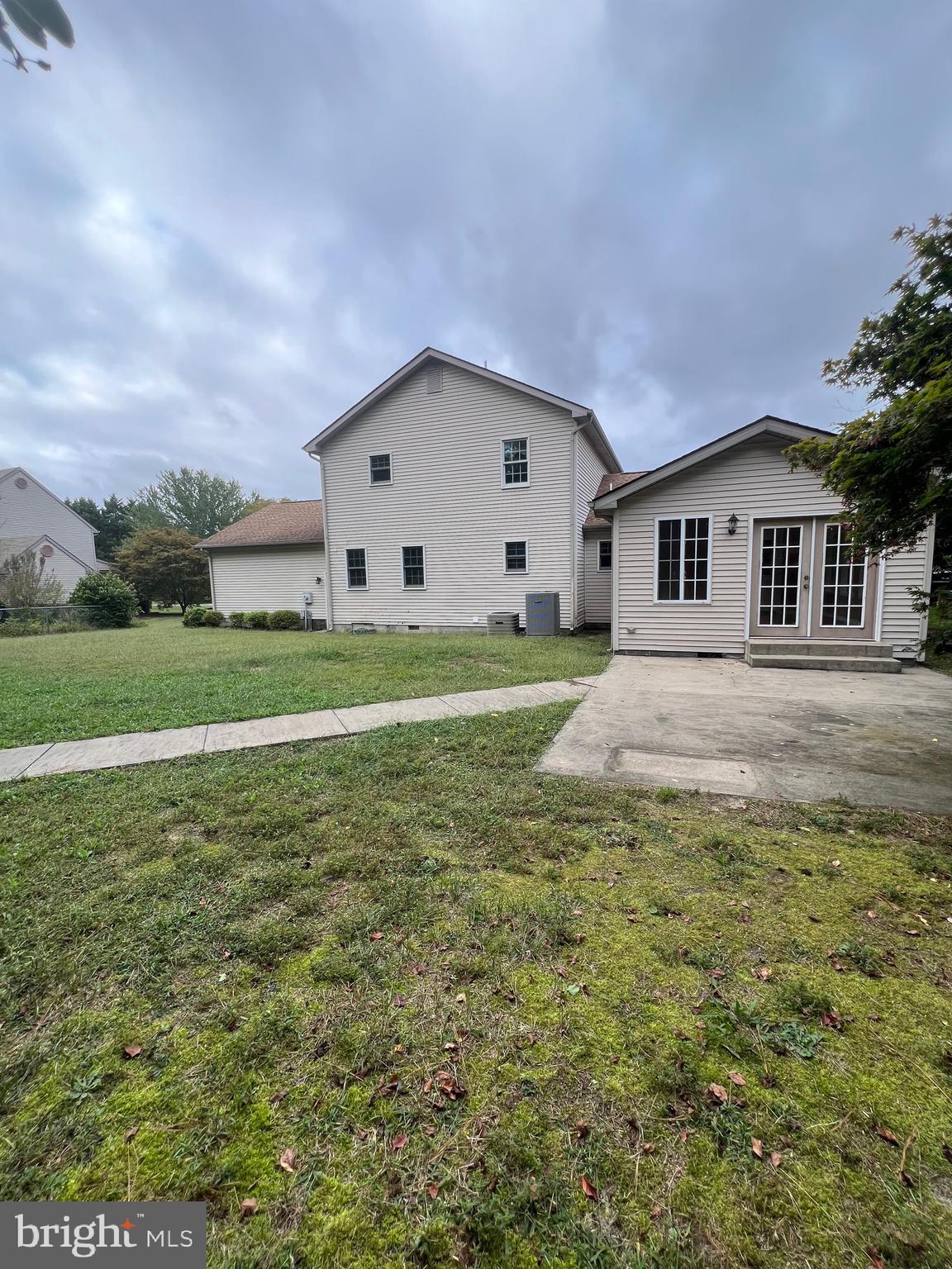 30883 Ward Road Salisbury, MD 21804 - Photo 5 of 34 a front view of a house with a yard
