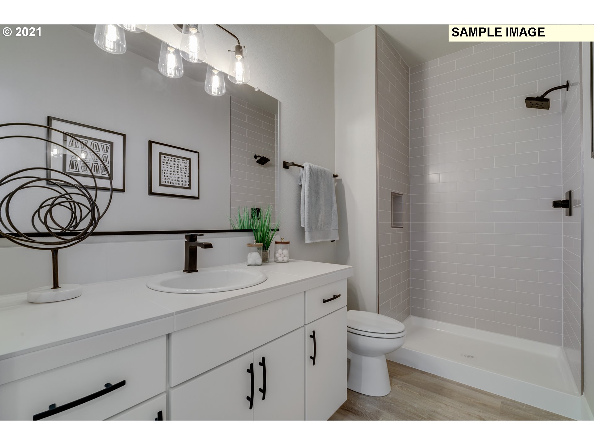 17622 Southwest Sunview Lane Beaverton, OR 97007 - Photo 18 of 29 a bathroom with a sink a toilet and shower