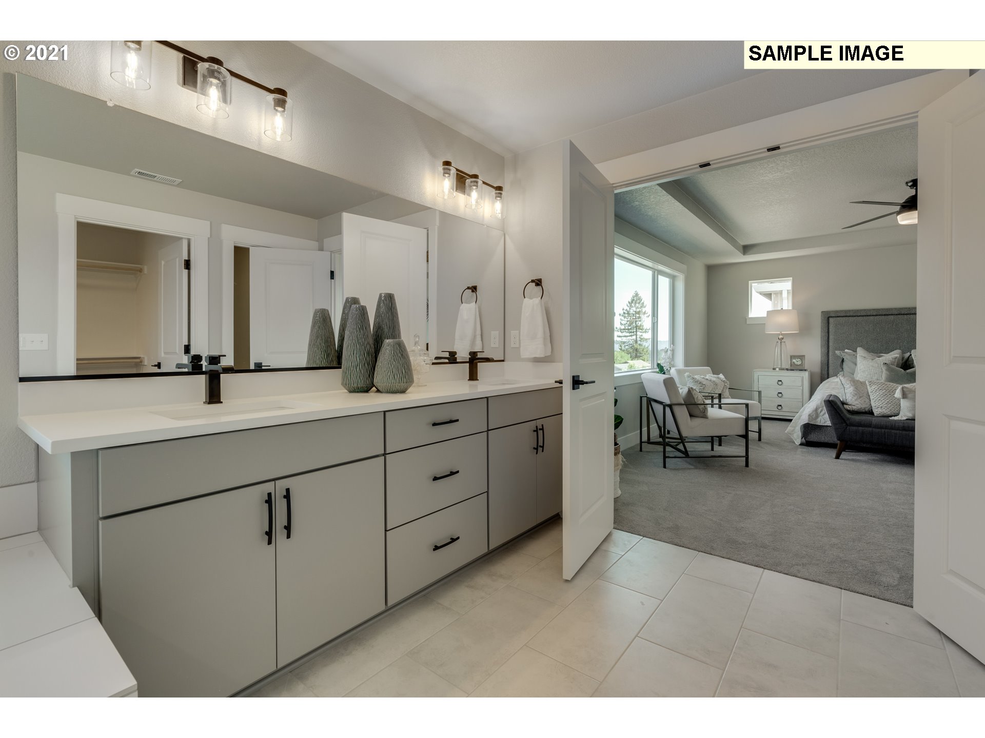 17622 Southwest Sunview Lane Beaverton, OR 97007 - Photo 25 of 29 a en suite bathroom with double sink and a mirror