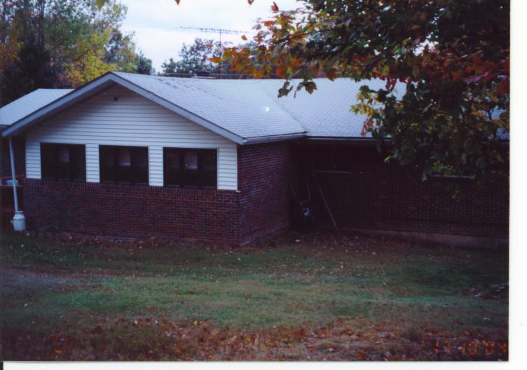 1054 Pine Ridge Bushkill, PA 18324 - Photo 4 of 6 Rear yard ,Florida room.