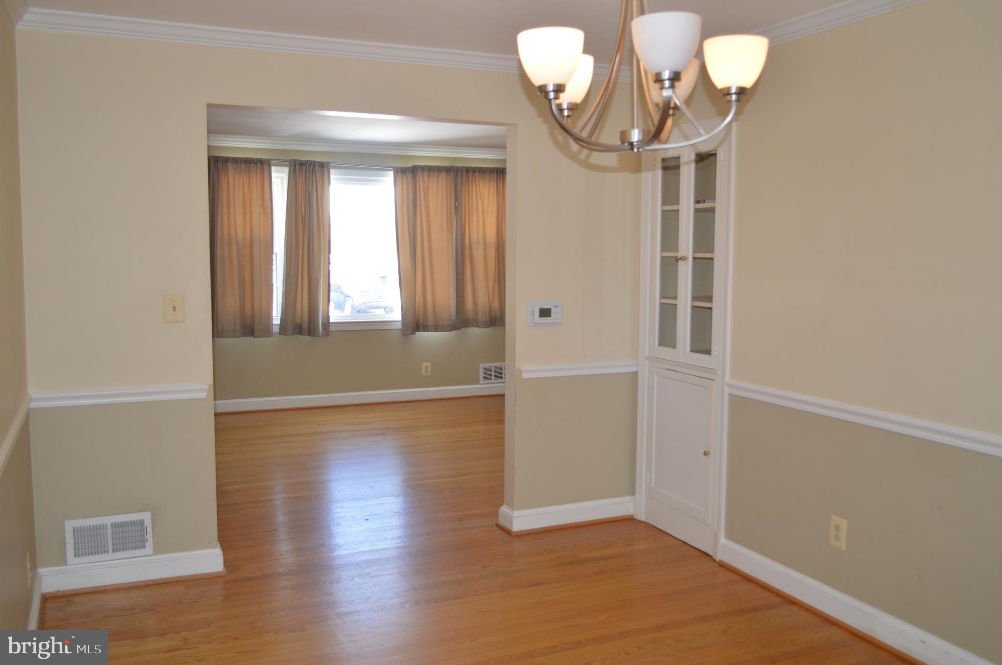 10110 Portland Road Silver Spring, MD 20901 - Photo 13 of 39 Chair-rail and built-in cabinet