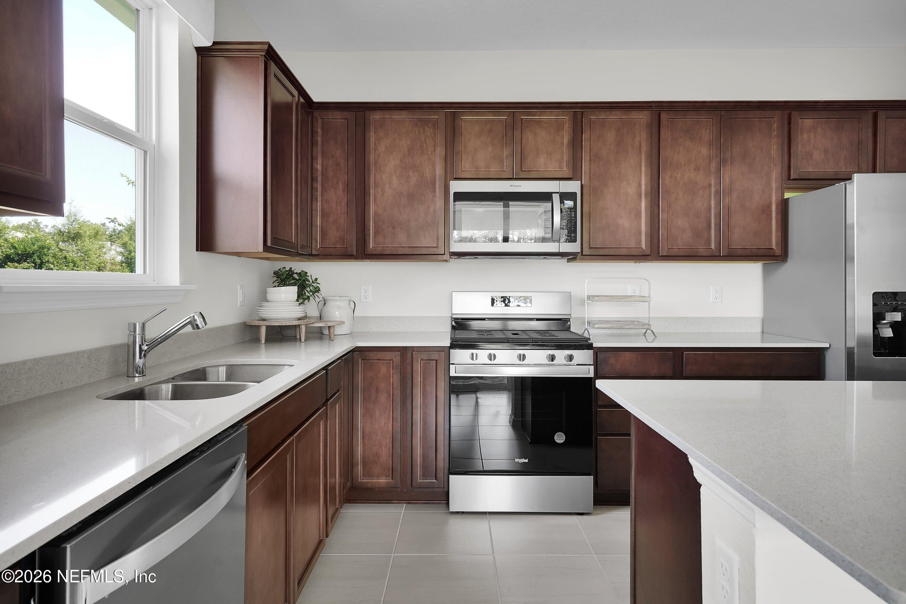 614 Ecliptic Loop Yulee, FL 32097 - Photo 12 of 41 Compass Kitchen