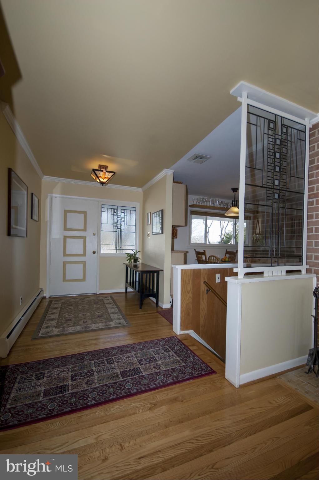 14612 Sturtevant Road Silver Spring, MD 20905 - Photo 2 of 22 a kitchen with sink refrigerator and stove