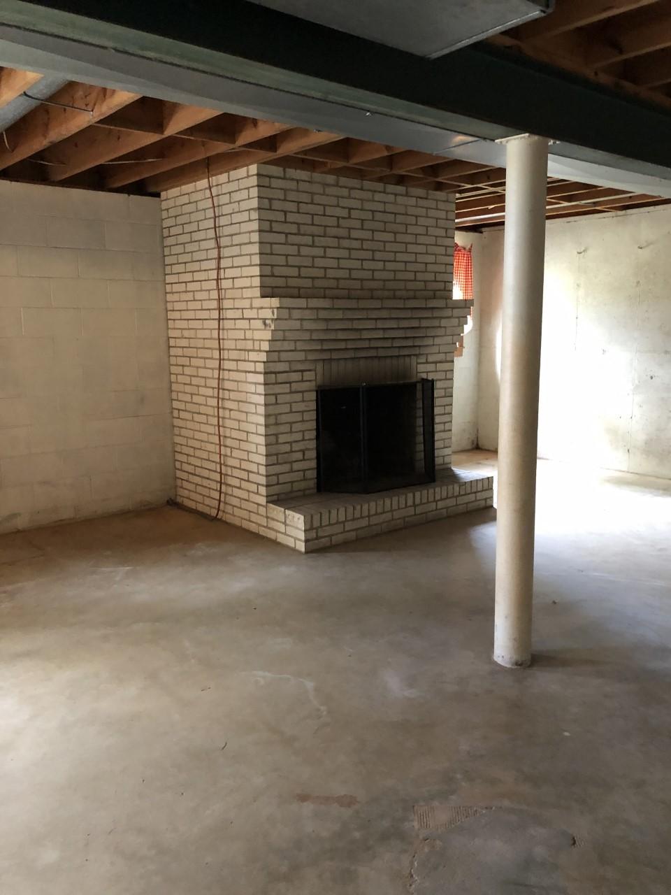10091 Henry Road Henry, VA 24102 - Photo 34 of 40 a view of empty room with a fireplace