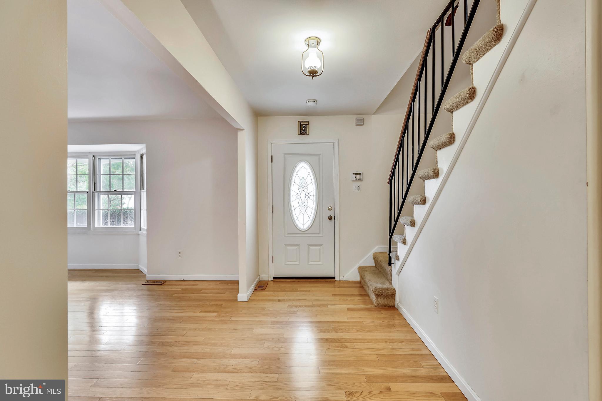 8902 Churchfield Lane Laurel, MD 20708 - Photo 8 of 30 Foyer - gleaming hardwood thru-out main level