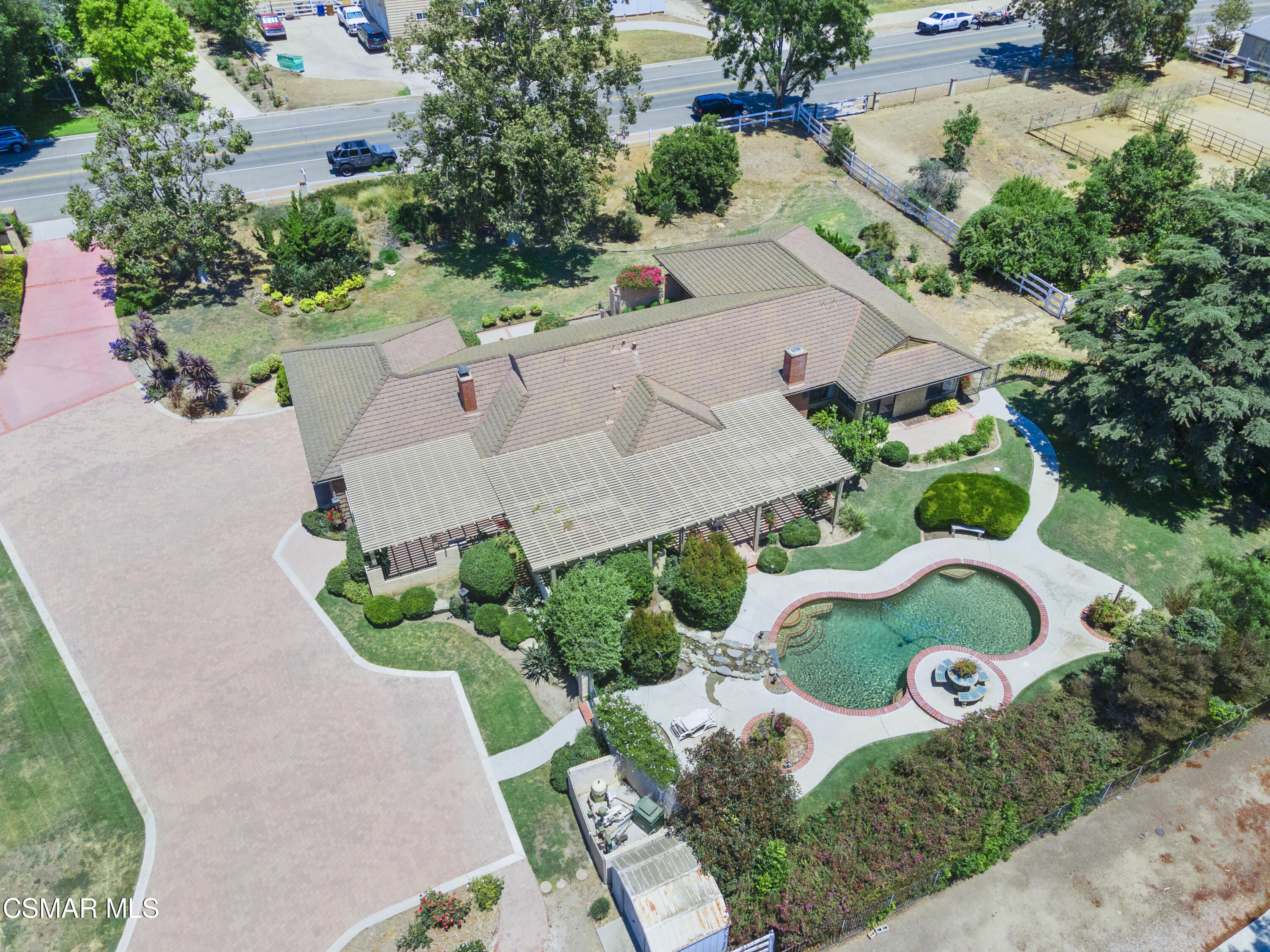 2774 Las Posas Circle Camarillo, CA 93012 - Photo 18 of 48 an aerial view of a house with a garden and lots of trees